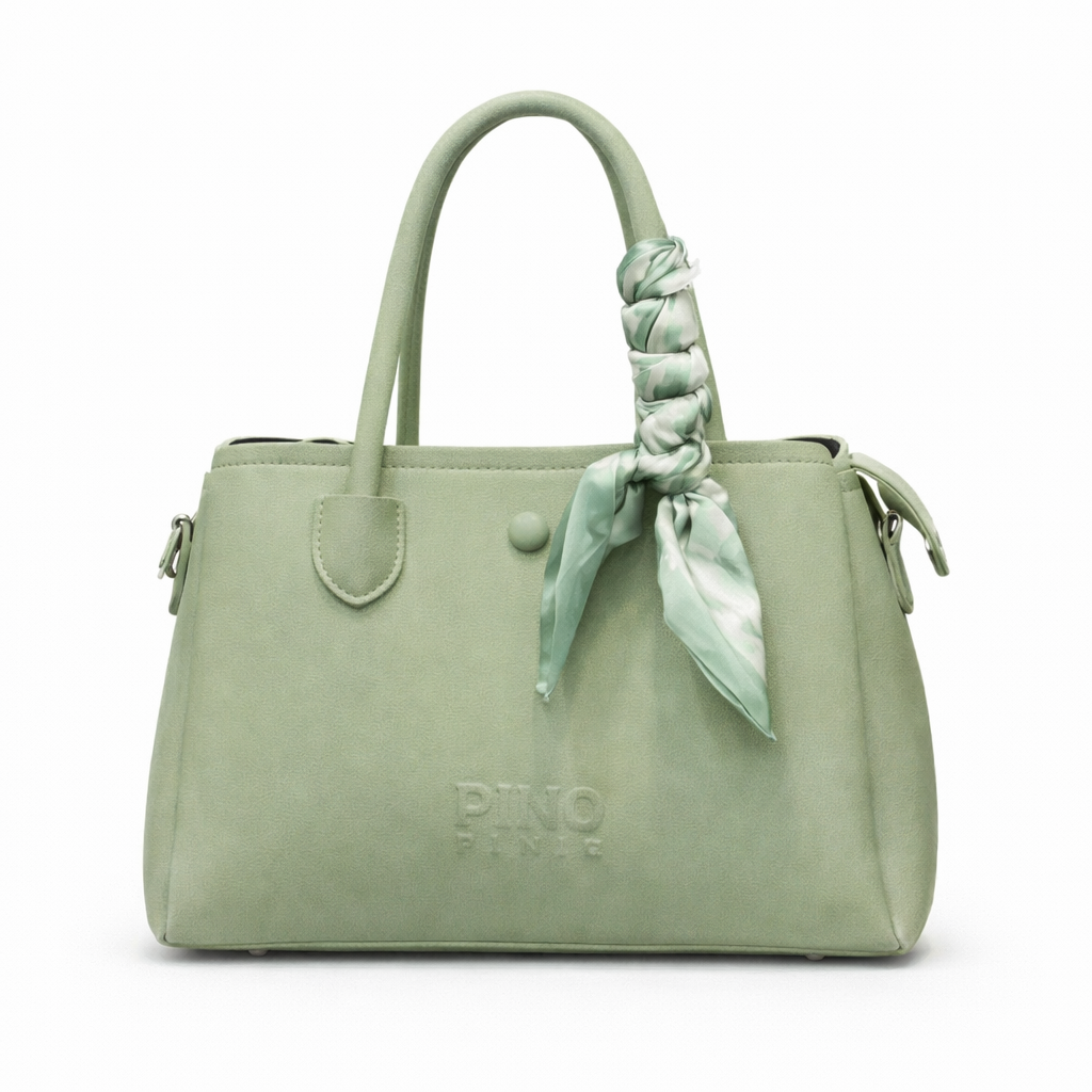 Green handbag with a matching scarf on a white background