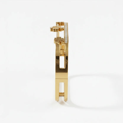 Gold earring with a white background