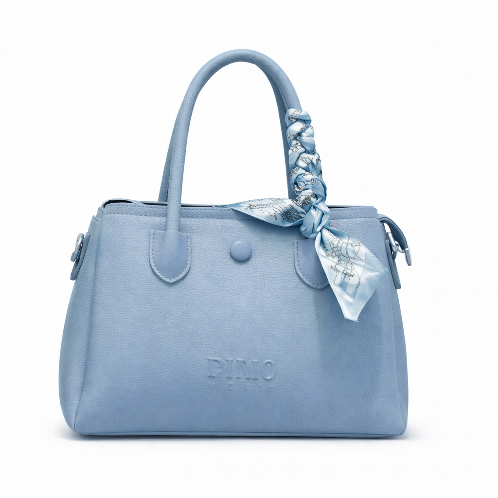 Light blue handbag with a matching scarf on a white background