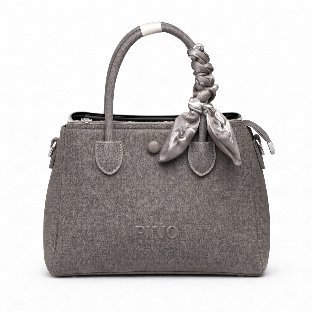 Gray handbag with a decorative scarf on a white background
