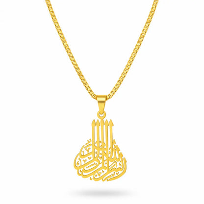 Gold necklace with a intricate pendant on a white background