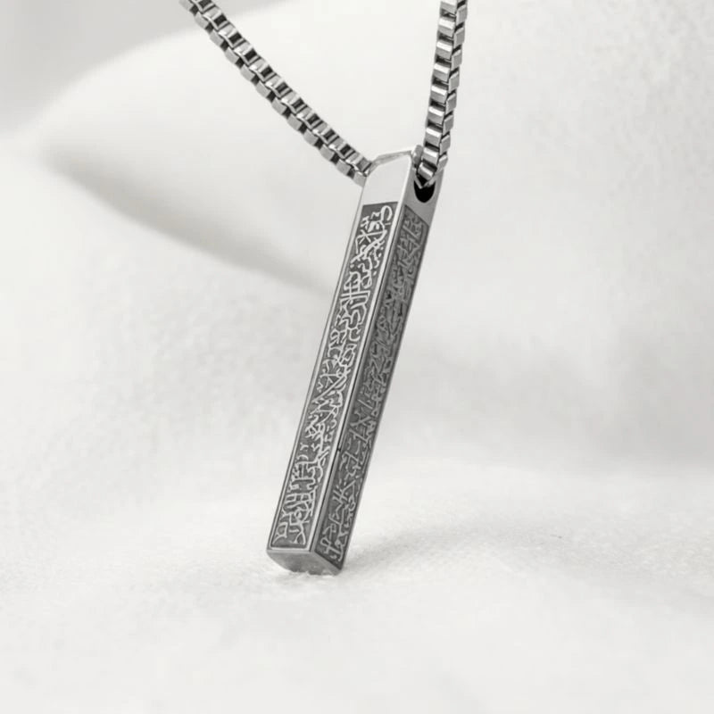 Silver pendant necklace on a white background