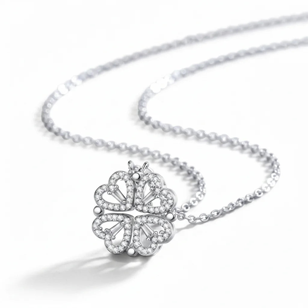 Silver butterfly pendant necklace on a white background