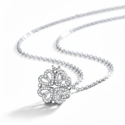 Silver butterfly pendant necklace on a white background