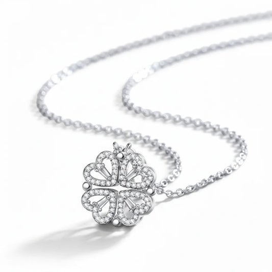 Silver butterfly pendant necklace on a white background