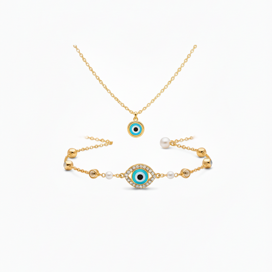 Gold necklace and bracelet set with eye-shaped charms on a white background