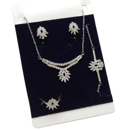 Silver jewelry set with necklace and earrings on a black display card.
