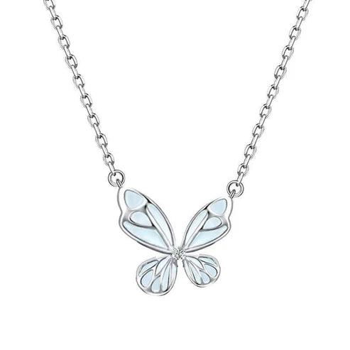 Butterfly-shaped pendant on a chain against a white background