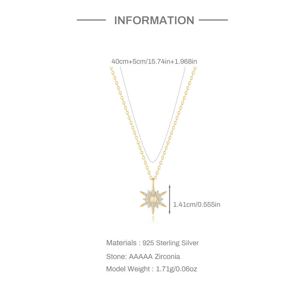 Gold necklace with star-shaped pendant on a white background